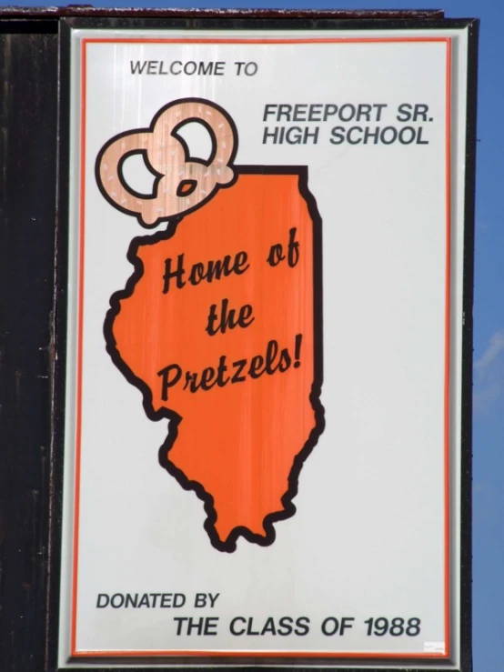 a sign for a high school in front of the state of illinois