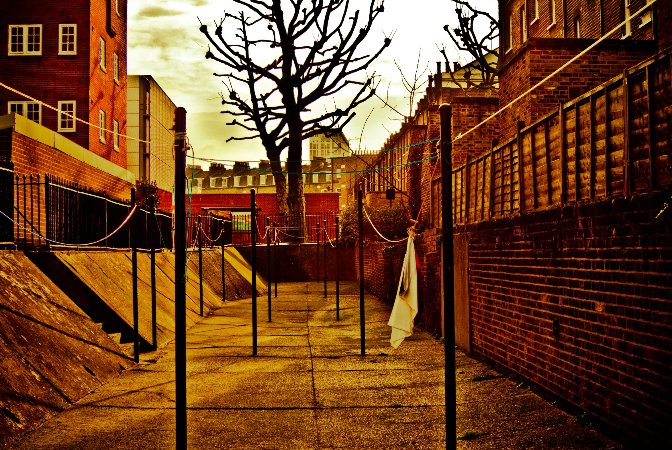 some old buildings a clock and street lights