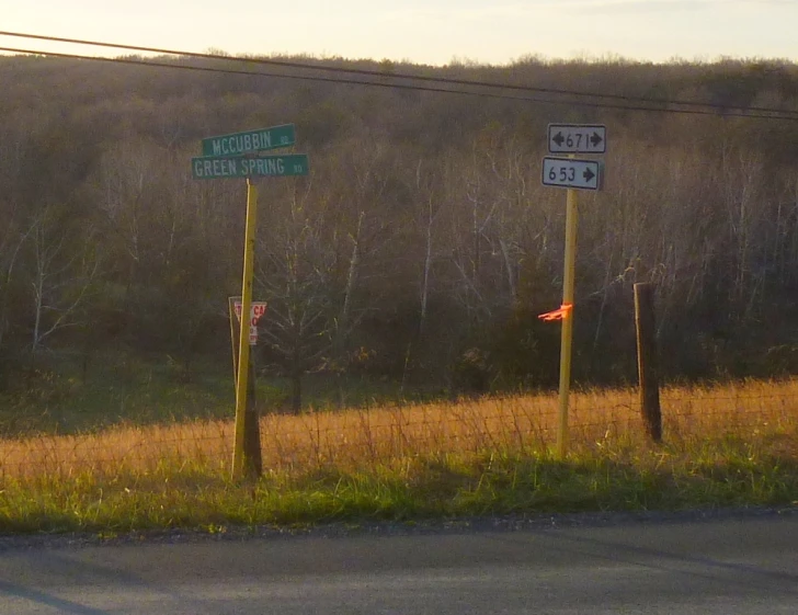 a street sign with directions to the different roads