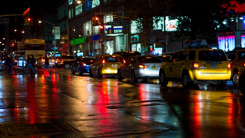 a bunch of cars parked on the side of the road