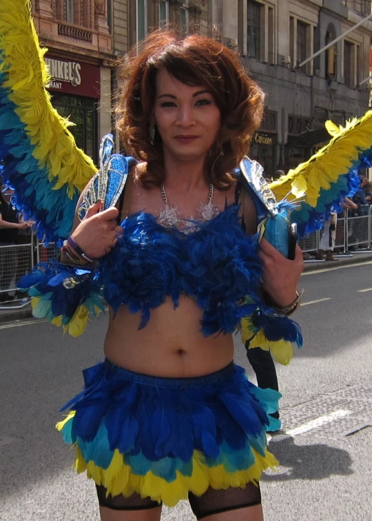 a woman with bright, blue and yellow costume on