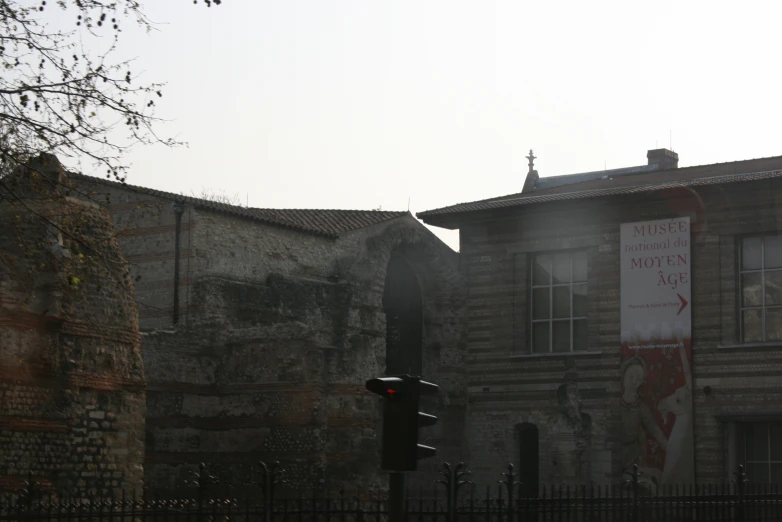 a big old building with graffiti on the side of it