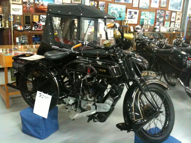 a motorcycle is on display in a room