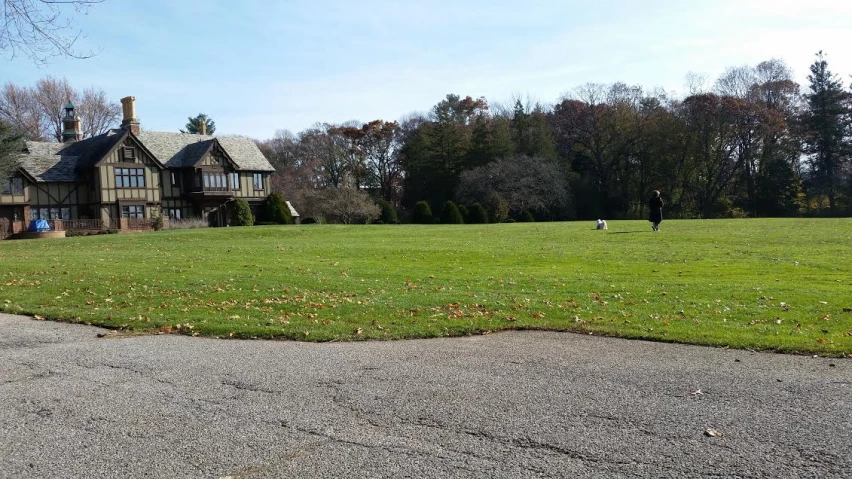 this old farmhouse is near the edge of a field