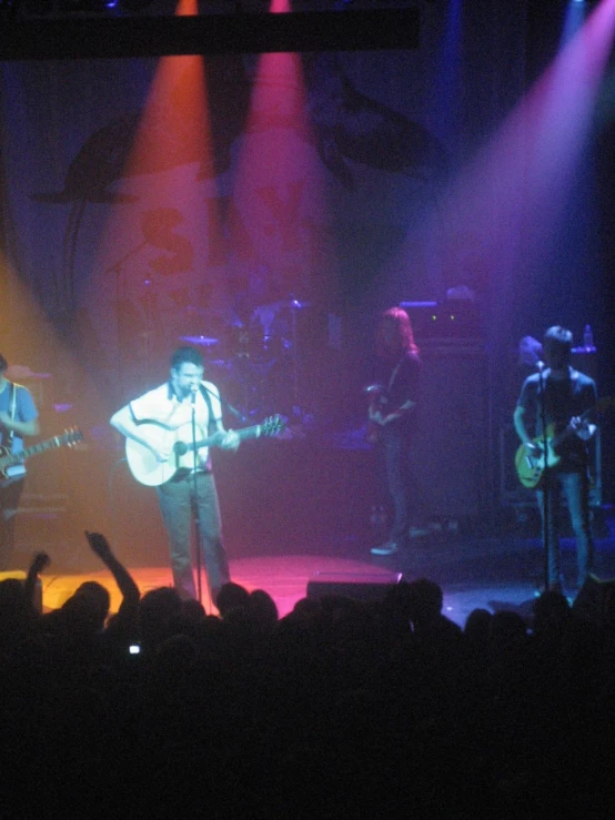 an image of a band playing at a concert