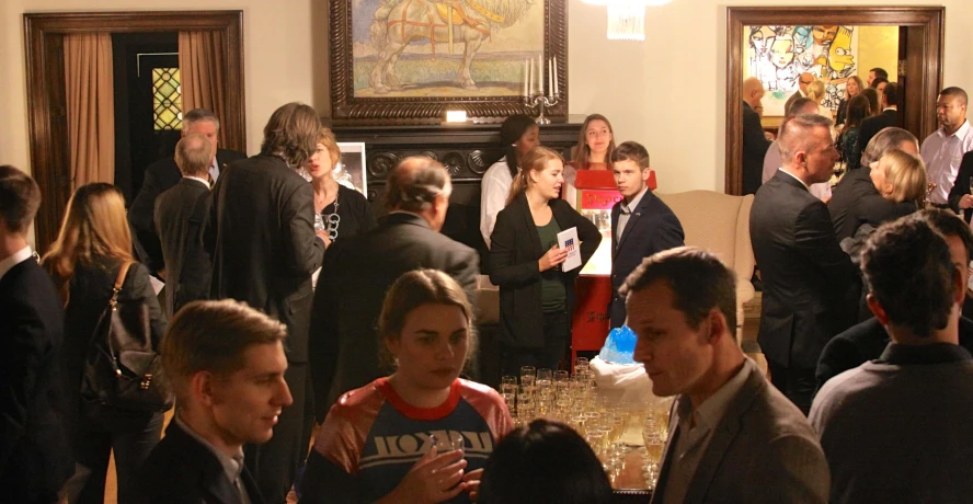 a group of people at a wine tasting