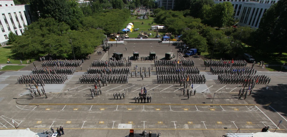 a large group of people in a parking lot