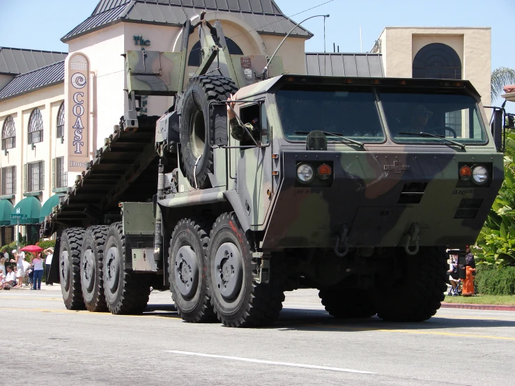 a military vehicle parked on the side of the road