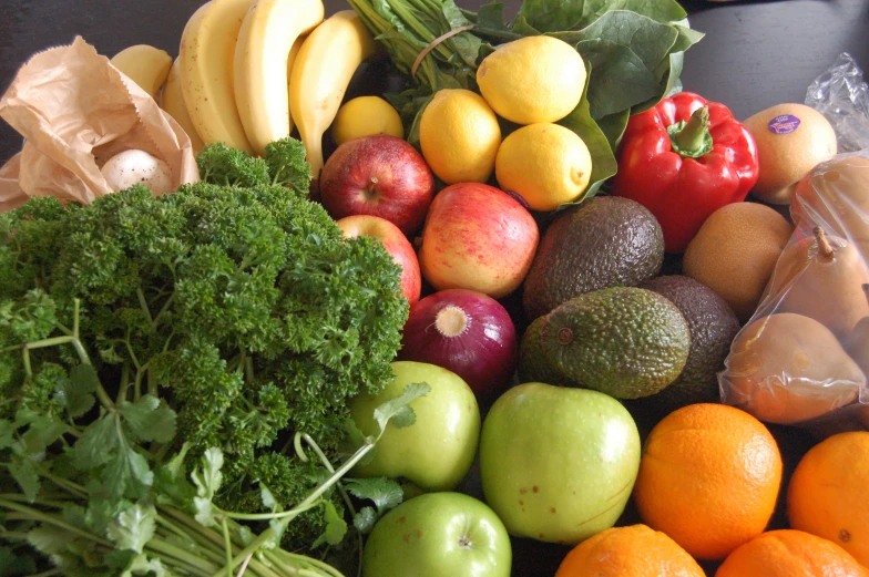 a variety of fruits and vegetables are displayed