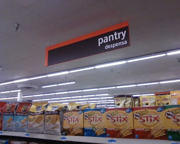 a store shelf filled with packages of cereal and other items