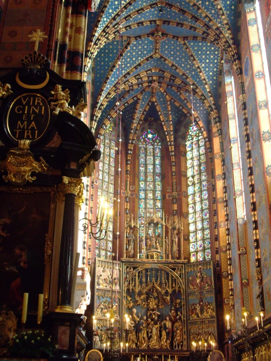 the altar inside a church with blue ceilings