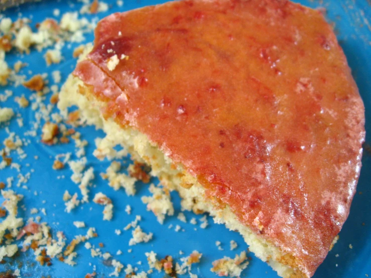 a piece of cheese pizza sitting on top of a blue plate