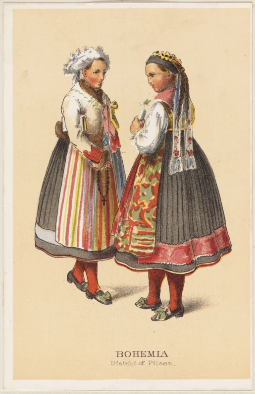 two woman in colorful clothing are talking to each other