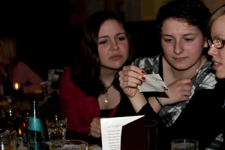 a couple of people that are sitting at a table