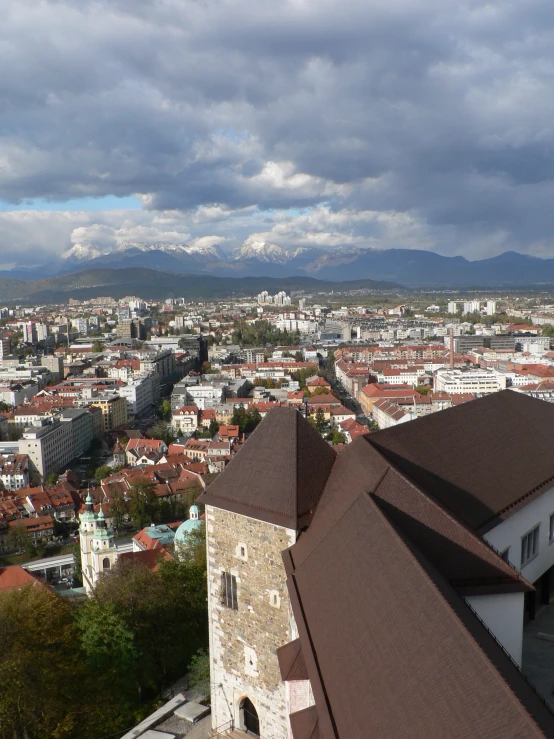 a panoramic view of a city with brown roofs