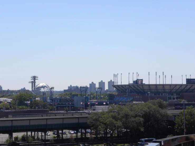 a sports complex and stadium under clear skies