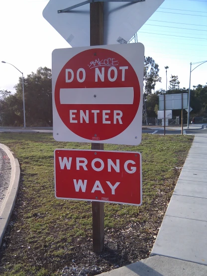 an altered warning sign on the road for wrong people