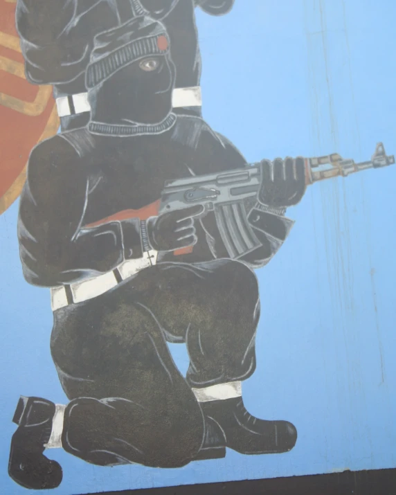 a painted wall with a painting of a soldier