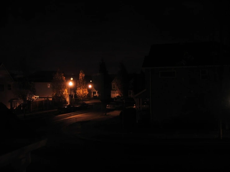 a street at night with some lights on