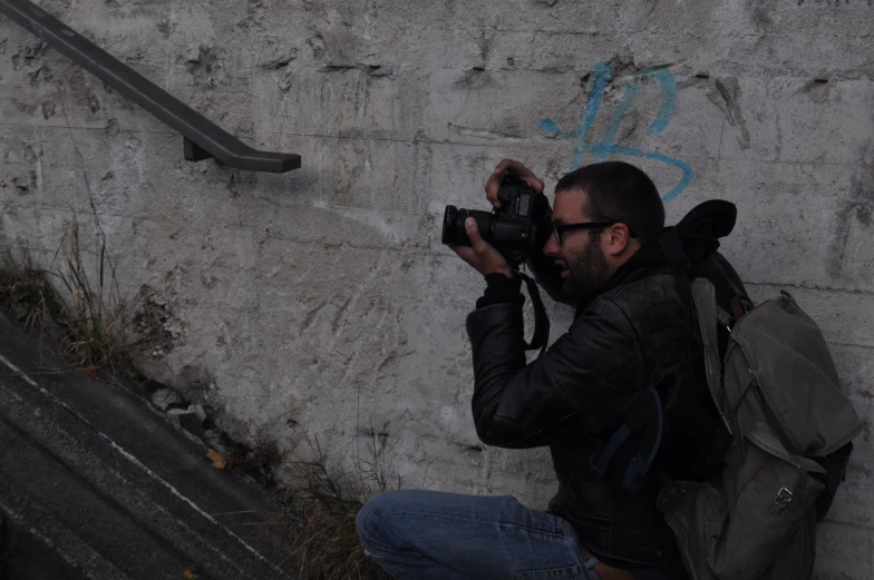 a man taking a picture with his camera