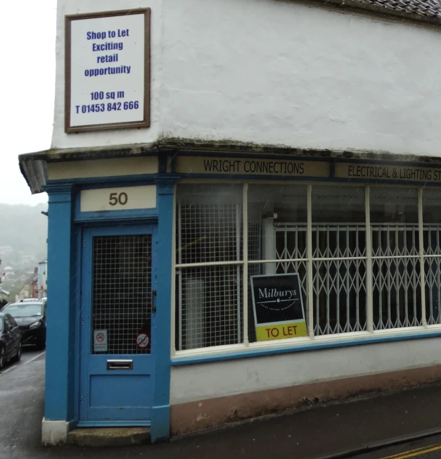 a building that has a sign above the door