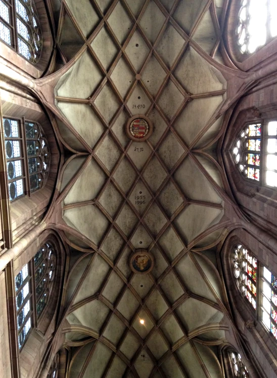 an ornate cathedral ceiling is featured in this po