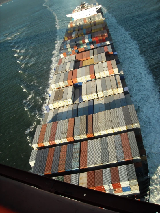 the container ship is moving through the water