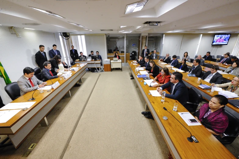 a class room full of people sitting down for class