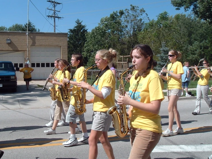 band members playing instruments in an outdoor ceremony