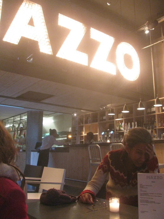 the sign for a restaurant saying it is not called azzzo