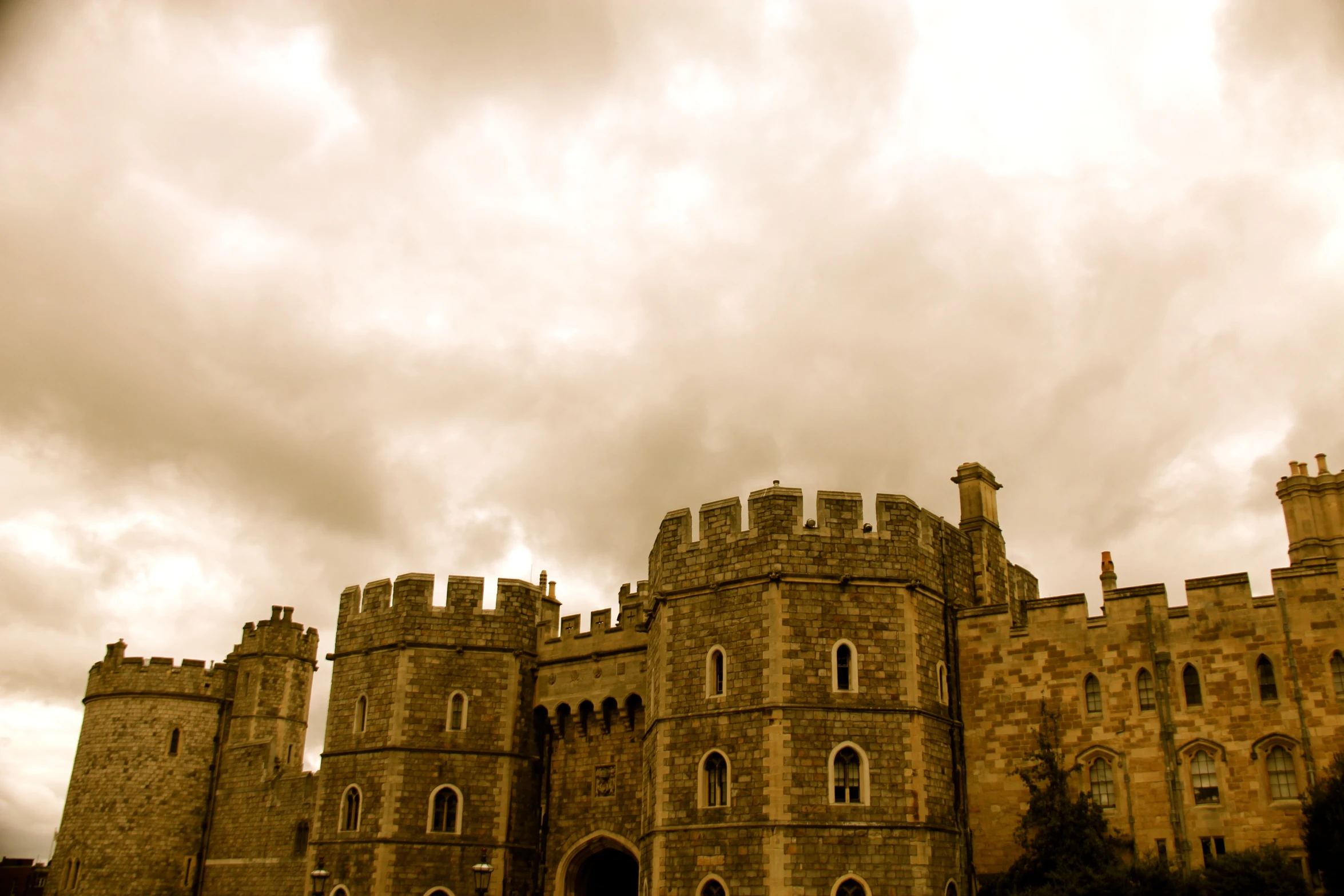 a very tall castle with a clock built in the middle