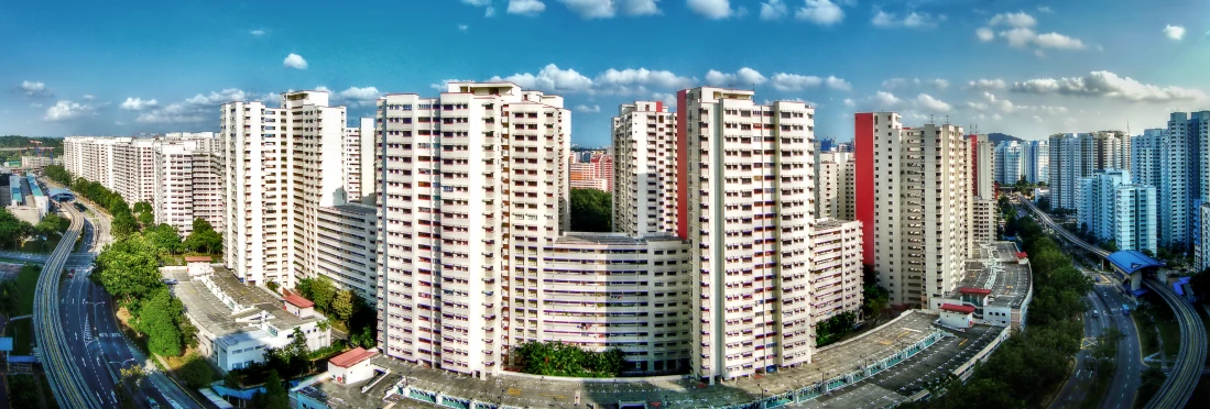 the tall buildings with multiple floors are lined up