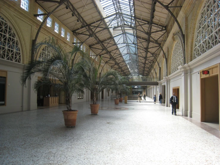 the inside of a building with glass ceilings