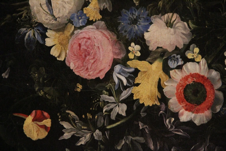 an ornate painting with flowers on a black background