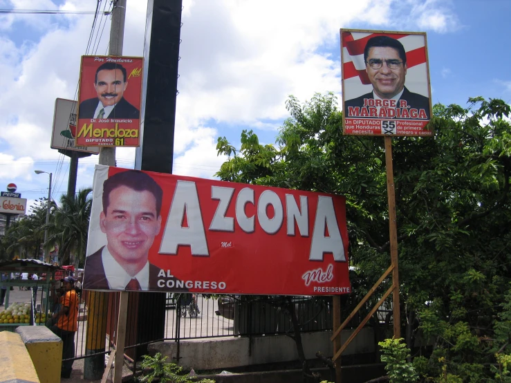 political banners showing president chavez and then former president barack obama