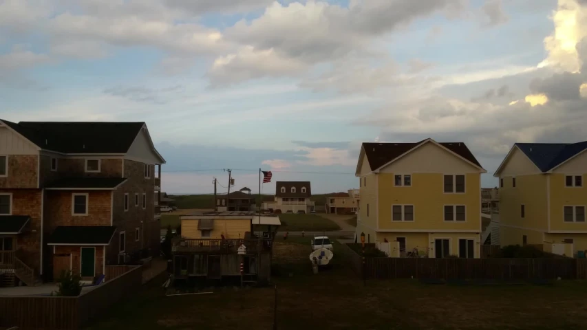 a group of houses that are standing near each other