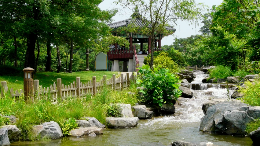 a small river flowing in between two rocks