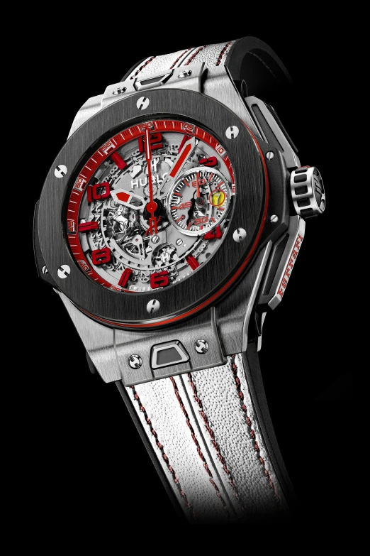 a black watch with red accents and red dials