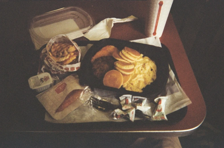 a table with breakfast items and a napkin