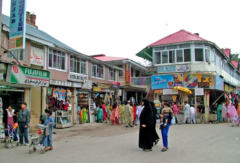 a bunch of people that are standing in the street