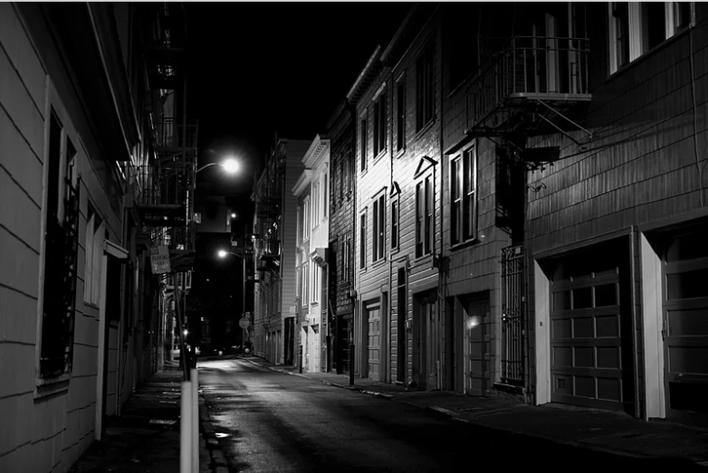 a dark alley at night time