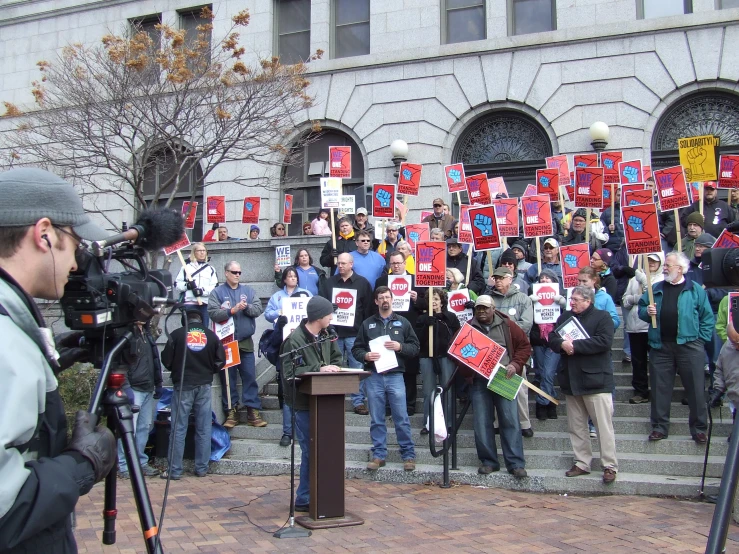 the crowd is protesting a political rally on the steps