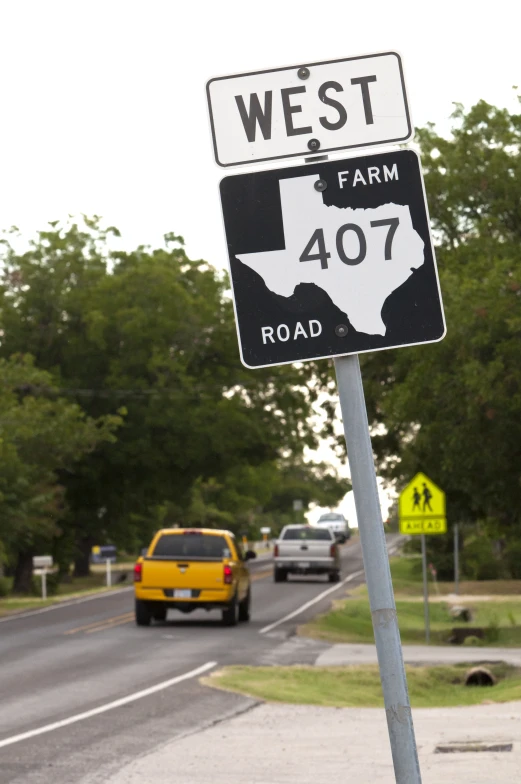 the highway signs indicate us where the west and farm is