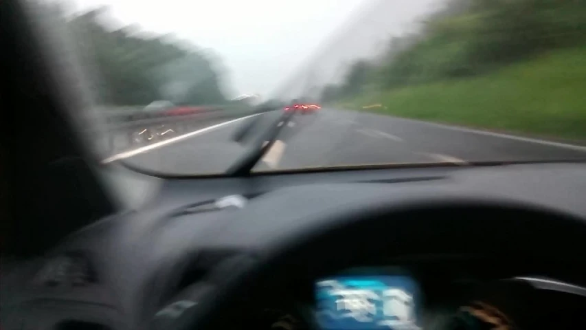 a view of the windshield and interior of a vehicle through the windshield