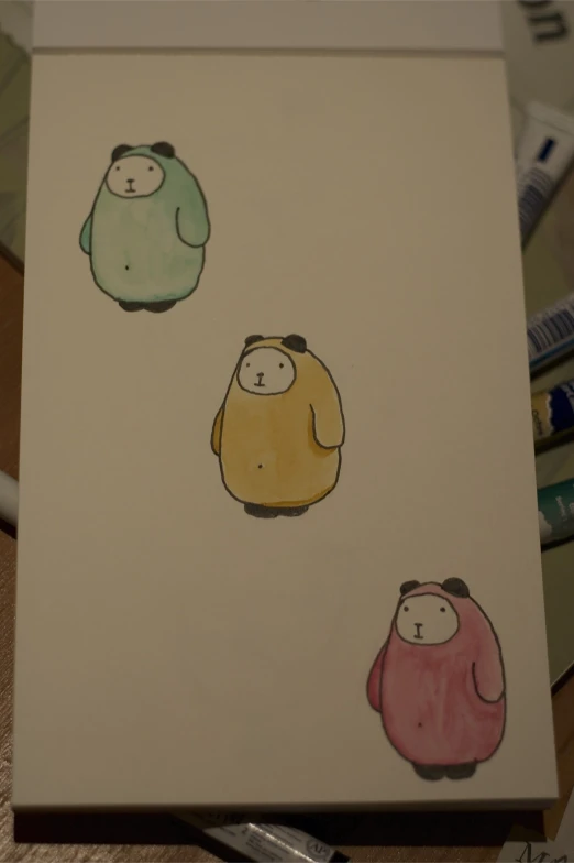 two colorful bears are standing next to each other