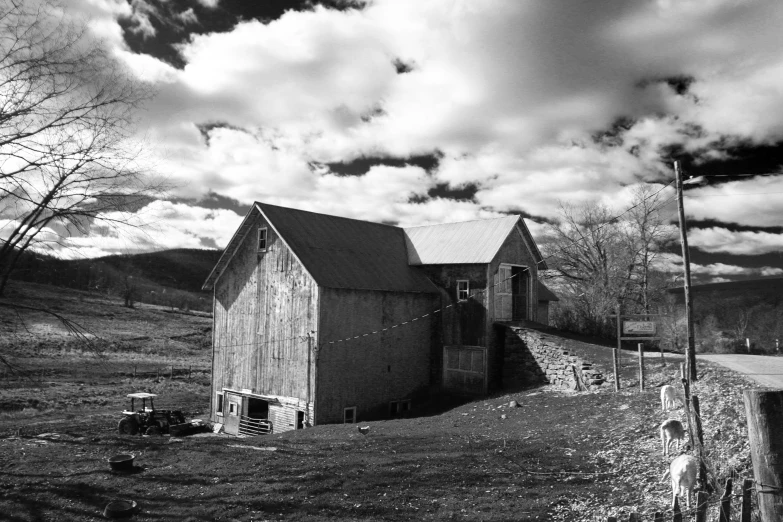 the barn is by itself in this field