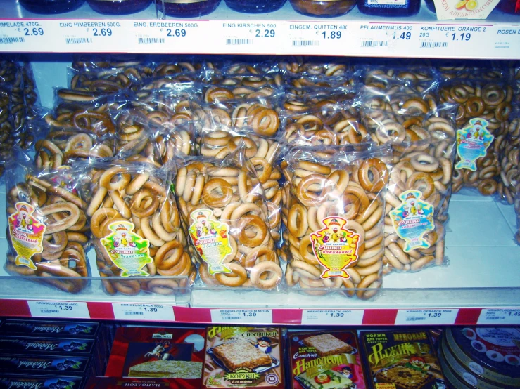 a display in a store filled with different kinds of pretzels