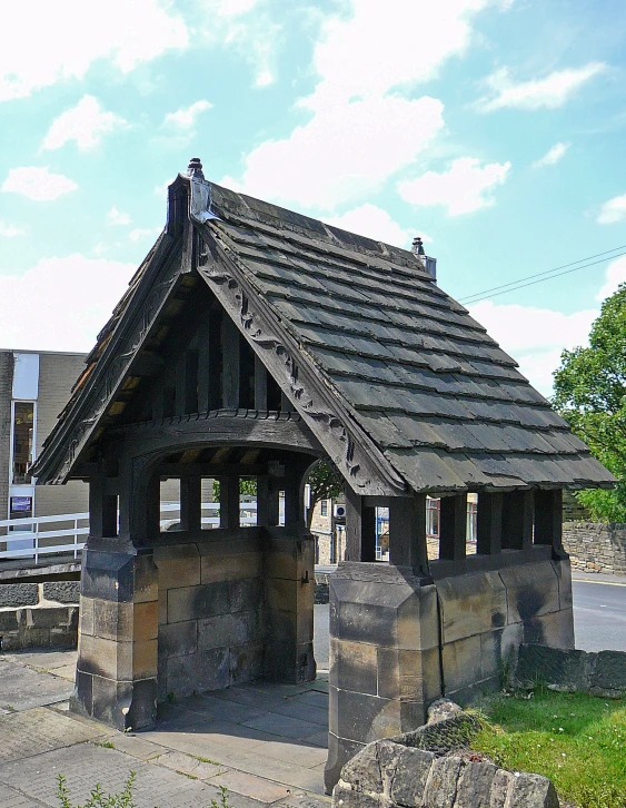 a very old building with a clock on the top