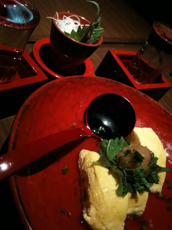 a bowl filled with food sitting on top of a table