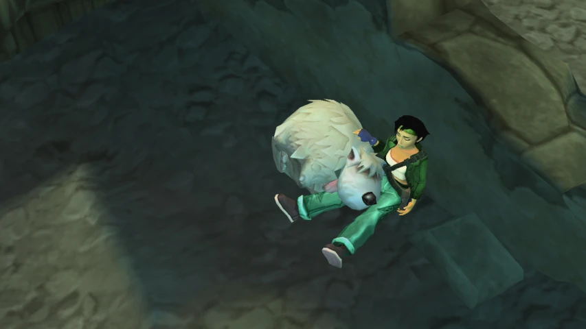 a boy laying on a huge animal on the ground